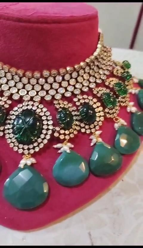 Kundan choker with carved emerald stones and green drops