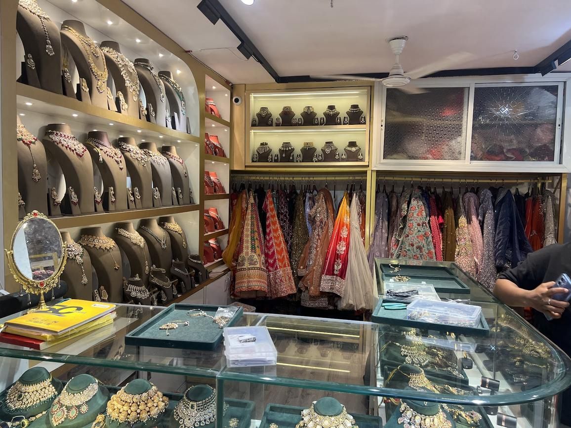 Inside Maeri: jewellery busts lit on gold shelves and racks of lehengas